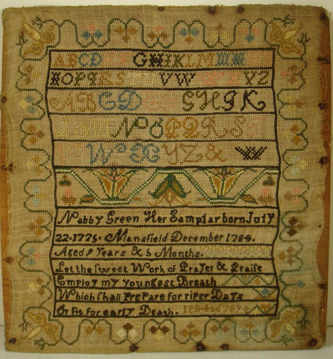 18th Century Cross Stitch Sampler: 1784 Massachusetts Sampler with Alphabets & Verse: Rows Separated with Black Cross Stitch, Wide Center Row of Flowers. "Nabby Green Her Sampler Born July 22-1775-Mansfield December 1784. Aged 9 Years
