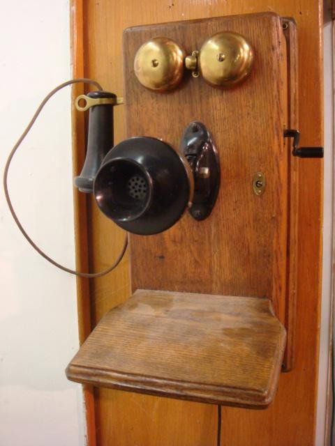 Oak Case Crank Wall Phone:: Oak Case Crank Wall Phone: Has Old Time Works and Bells. Consignor Says It Works! Turn the Crank and ask the Operator for BR 549. Adjustable Mouth Piece. Turn Crank and Bells Ring. 19"T, 8"W. (200-350