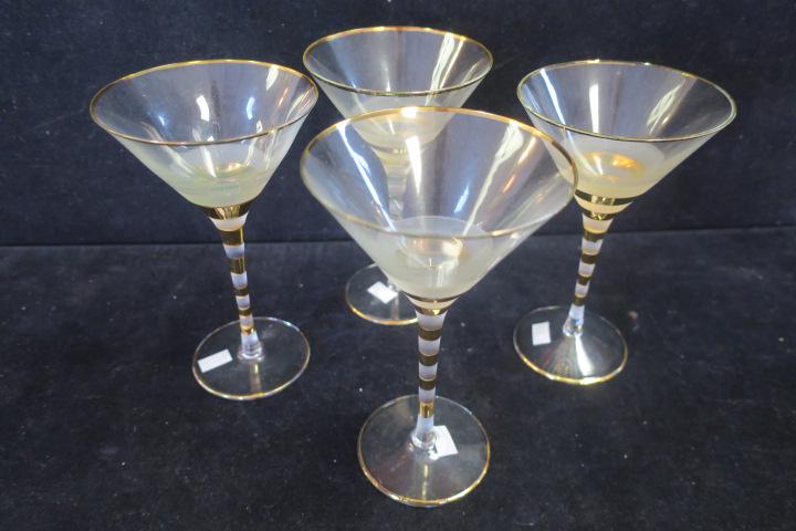 Four Mid Century Gold Striped Martini Glasses:: Four Mid Century Gold Striped Martini Glasses: Each with Frosted and Gold Stripes Around Stem and Gold Rims. 7"T. Some Wear to Gold. (80-160)