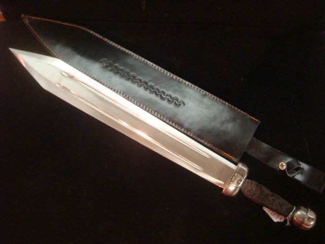 Bud K Roman Replica Gladius with Sheath:: Bud K Roman Replica Gladius with Sheath: Famous Replica Weapons maker Roman Gladiator Sword in Stainless Steel, #BK388. Wooden Handle and Steel Ball Pommel. Blade is 22 1/2" Long with 7" Handle Hilt a