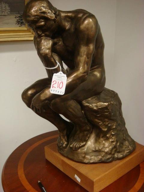 Bronze Look Ceramic RODIN Statue of The Thinker:: Bronze Look Ceramic RODIN Statue of The Thinker: Replica of Auguste Rodin's Famous Statue of The Thinker at the Louvre. 17"T on Square Wooden Plinth. (100-200)