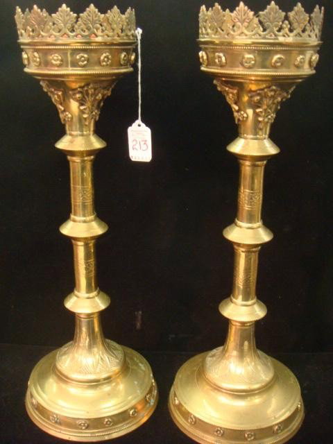 Pair of Tall Heavy Brass Candlesticks:: Pair of Tall Heavy Brass Candlesticks: Each Candlestick is 19"T With Crown Top and Rosettes around Top and Base. 4 1/2" Diameter at Top with Candle Spike. (180-300)