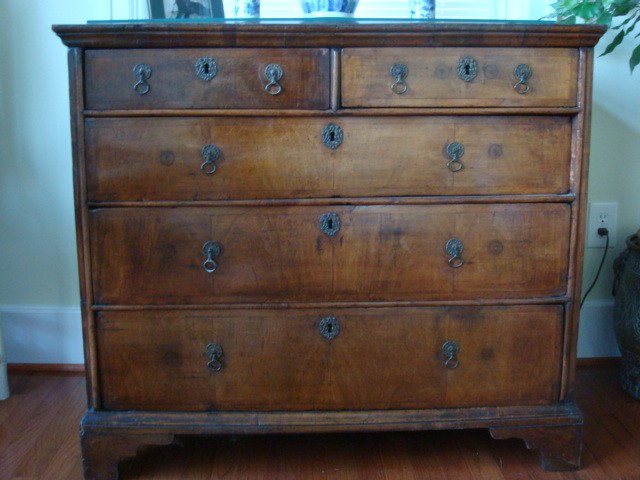 William and Mary Transitional Five Drawer Dresser: 145A. William and Mary Transitional Five Drawer Dresser: English Oak and Walnut. Floral Hardware. Banded Top 2 Drawers over 3 Graduated Drawers. Ogee Bracket Feet. 1700-1710 (800-1200)