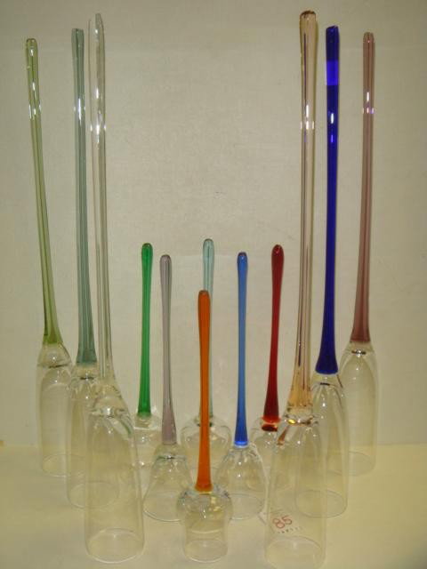Twelve Hand Blown & Hand-Held Glass Stems:: Twelve Hand Blown & Hand-Held Glass Stems: 6 X 17" Champagne Flutes, 6 x 9 1/2" Sherries, Thistle and Oval Shaped Bowls. Various Colored Stems in Reds, Orange, Greens, Blues, Violets and Clear. (60-12