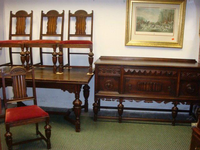 7 Piece Renaissance Revival Oak Dining Room Suite:: 7 Piece Renaissance Revival Oak Dining Room Suite: Sturdy 4' X 3'2" Table with Spoon Carved Legs. 5 Matching Chairs with Ribbed Splat and Applied Fan Back. 2 Door 2 Drawer Sideboard with Pattern Repea