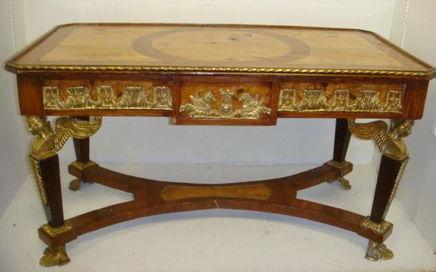 French Influenced Burl Tea Table with Brass Ormolu: French Influenced Burl Tea Table with Brass Ormolu: 6 Panel Stem on Sculpted Base with 6 Lion Paw Feet. Applied Swag and Tassel Around Apron. Trimmed in Twisted Rope Design. Fitted Glass Top. 30"T and