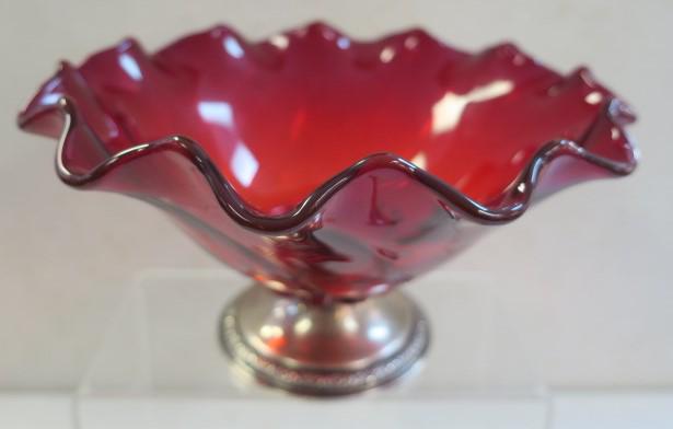 Beautiful Ruby Glass Bowl with Sterling Foot:: Beautiful Ruby Glass Bowl with Sterling Foot: Ruffled Deep Red Bowl is Set on International Prelude Pattern Sterling Silver Foot. 5"T, 9 1/2"D. (100-200)