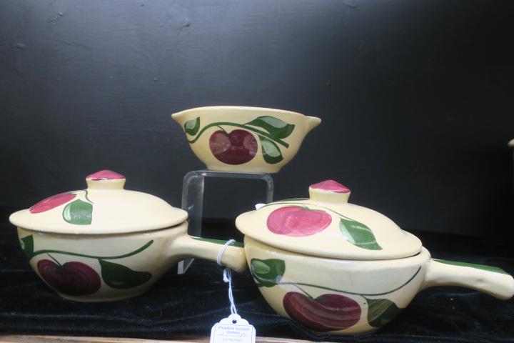 3 WATT Apple Pottery Handled Individual Casseroles:: 3 WATT Apple Pottery Handled Individual Casseroles: Pair of #18 Stick Handled Lidded Casseroles and One #18 Tab Handled Casserole. (150-300)