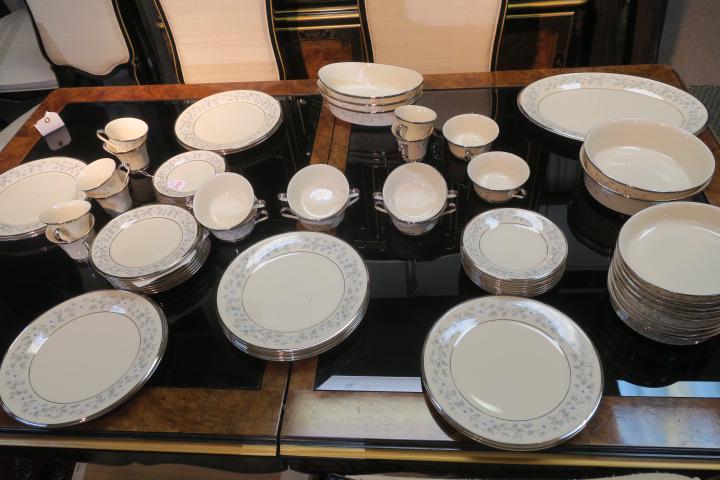 LENOX "Windsong" Dinnerware, 75 Pieces:: LENOX "Windsong" Dinnerware, 75 Pieces: CA 1965-1993. White Flowers with Blue/Grey Leaves, Enamel Dots. Platinum Rim. Twelve 10 3/4" Dinner Plates, Eight Each 8 1/8" Salad, 6 1/4" Bread and 7 1/8" Des