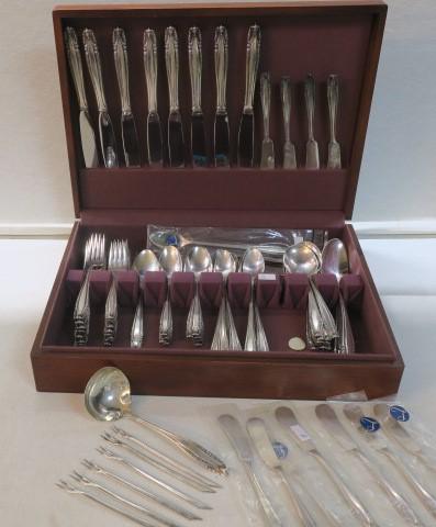 WALLACE "Stradivari" Sterling Silver Flatware:: WALLACE "Stradivari" Sterling Silver Flatware: Designed by William S. Warren, 1937. Eight Table & Salad Fork, 8 Knives, 10 Teaspoons, 10 Cream Soup Spoons, 12 Iced Tea Spoons, 11 Flat Butter Spreaders