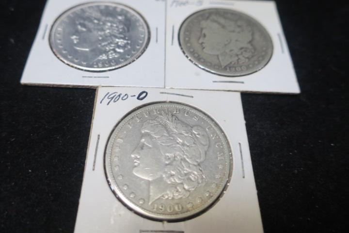 Three 1900 MORGAN SILVER DOLLARS, .90% Pure Silver:: Three 1900 MORGAN SILVER DOLLARS, .90% Pure Silver: 1900 Morgan Silver Dollar in MS 64 Condition, 1900 S in VF 20 condition and 1900 O in VF 40 Condition. (280-500)