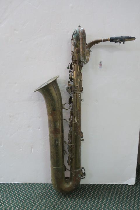 Baritone Saxophone, van MARIE ET CIE:: Baritone Saxophone, van MARIE ET CIE: The Biggest of the Saxophone Family Measures 40" Tall. Needs Restoration or a space on the Music Room Wall. From Paris, Made in France. (100-200)