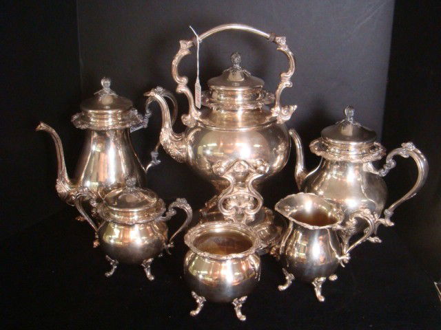 Six Piece SHERIDAN Silver Plate Tea Set with Warmer: Six Piece SHERIDAN Silver Plate Tea Set with Warmer: Sugar, Creamer, Waste Bowl, Coffee and Teapots. Knobbed Tilt Teapot with Burner Stand. Silver Over Copper with Sheridan Marks. Hinges Need Repair.