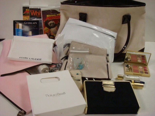 New Beige Suede Tote with WII Snowboarding and 2: New Beige Suede Tote with WII Snowboarding and 2 Kung Fu, Lancome Makeup Bag with Makeup, Guerlain Lotions, Estee Lauder Makeup/Bag/Box, Natura Bisse Lotion, Clinique Cosmetic Bag with Makeup. (100-20