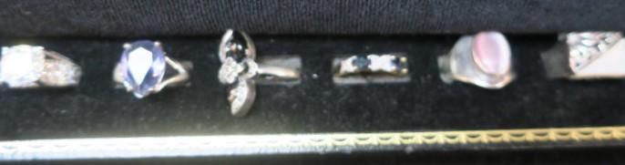 Six Sterling and Silver Ladies Rings:: Six Sterling and Silver Ladies Rings: Iridized Stone with Daisy Filigree Size 7. Marked 925 China with Pink Cats Eye SZ 6 1/2. 925 JJT (JJ Creations NY) 2 Blue Faceted Stones SZ 6 3/4. Marquisate with