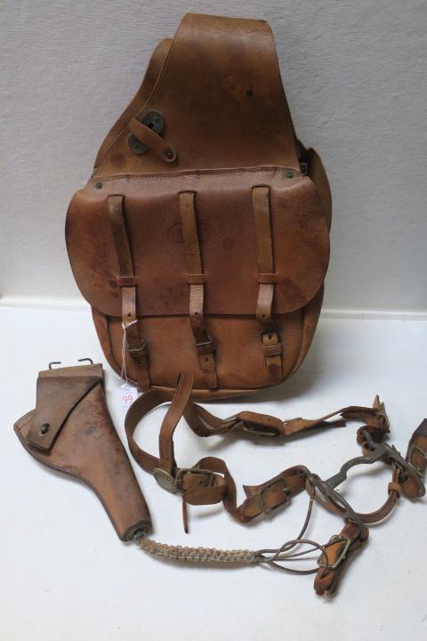 US CAVALRY Lot. Saddle Bags, Bridle and Holster:: US CAVALRY Lot. Saddle Bags, Bridle and Holster: Saddle Bags and Revolver Holster With Stamped US, Very Good Shape. Bridle in Fair Shape, Missing Reins. (100-200)