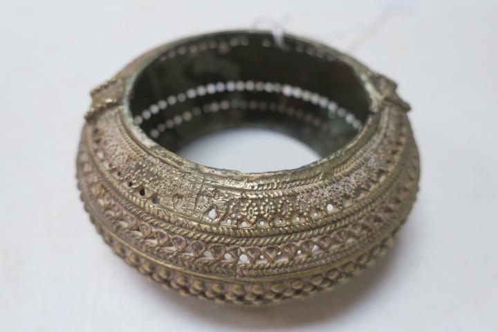 Antique Omani Brass or Bronze Anklet or Torque:: Antique Omani Brass or Bronze Anklet or Torque: Original, Beautifully Decorated Anklet. Were Often Used to Represent Wealth. 4 1/2" X 2" (100-200)