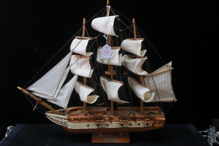 Frigate USS CONSTITUTION Hand built Wooden Ship Model:: Frigate USS CONSTITUTION Hand built Wooden Ship Model: Complete with Deck Guns and Lifeboats. Fully Rigged with Ratlines and Billowing Sails. 20" x 22" x 6". (300-600)