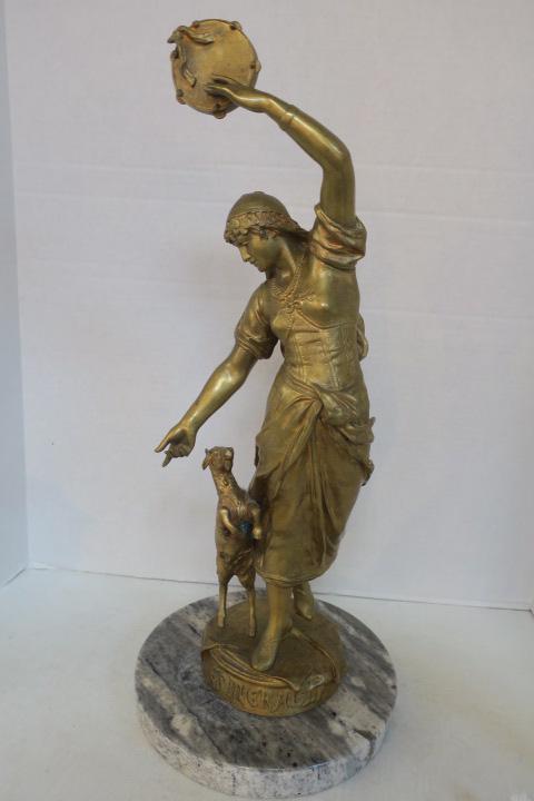 Eugene Marioton Statue of Esmeralda:: Eugene Marioton Statue of Esmeralda: From the Victor Hugo Novel, "Hunchback of Notre-Dame". The Young Girl who was Kidnapped by Gypsies and Replaced with the Deformed Quasimodo. She Danced Playing her