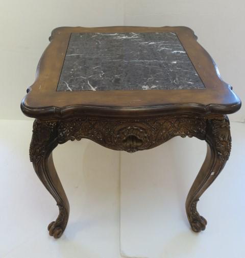 Heavily Carved Wood and Granite Top Coffee Table:: Heavily Carved Wood and Granite Top Coffee Table: Matches Item 234. 19 1/2"T, 41 3/4" Square. (160-500)
