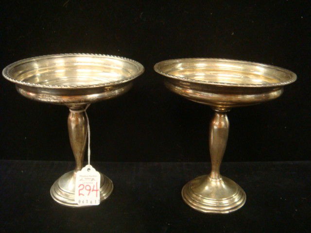 Pair of Sterling Silver Weighted Base Compotes: SPODE Off-White Imperial Fancies Bowl: Bowl has Floral Relief Pattern on Sides. 4"T, 9 1/2"D. Blue Spode England on Bottom with Raised K189. (60-100)