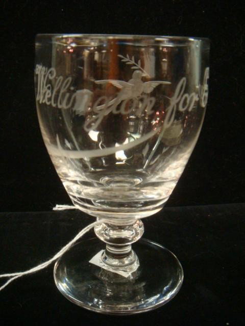 Duke of Wellington Commemorative Etched Glass Stem: Duke of Wellington Commemorative Etched Glass Stem: Etched name with Sword and Dove Honoring Battle of New Orleans, Last Major Battle of 1812. 4 1/4"T. (40-80)