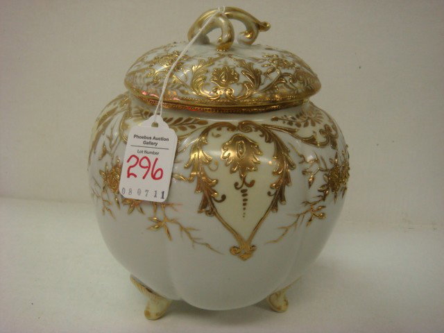 Hand Painted NIPPON Cracker Jar: : Hand Painted NIPPON Cracker Jar: Lobed Jar with Heavy Gold Floral Accents on Three Legs is 8"T. Has Blue Maple Leaf Mark. (40-60)