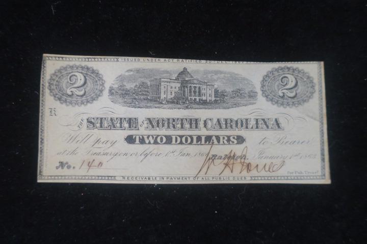 STATE OF NORTH CARLOINA Two Dollar Note, Jan 1st 1863:: STATE OF NORTH CARLOINA Two Dollar Note, Jan 1st 1863: In Choice Uncirculated Condition, Hand Signed and Numbered, Blank Reverse. (50-100)