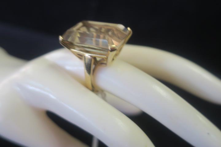 14 KT Gold Mounted Pale Brown Topaz Cocktail Ring:: 14 KT Gold Mounted Pale Brown Topaz Cocktail Ring: Sizable Prong Set Solitaire Stone Set in Open Trapeze Design, Size 7. (400-500)