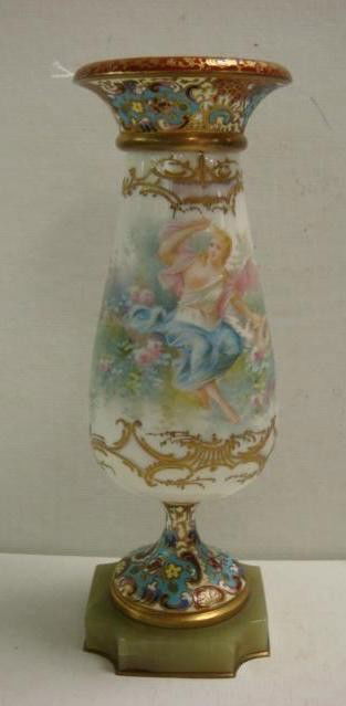 French Porcelain Hand Painted Vase: French Porcelain Hand Painted Vase: Urn Shaped Porcelain with Semi Nude Among Flowers with Delicate Gilt Trim. Polychrome Champlevé Rim and Foot, on Green Alabaster Plinth. Signed Berg. 8 1/2"T (400-