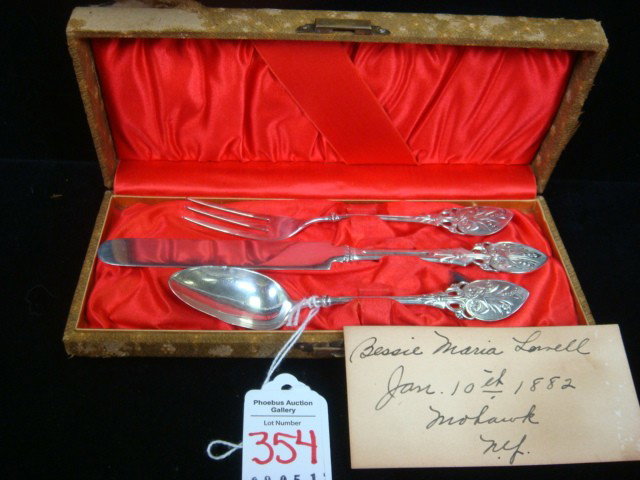 GORHAM 1882 Childs Sterling Silver Flatware in Cas: GORHAM 1882 Childs Sterling Silver Flatware in Case: Set Includes 5 1/4" Fork, 6 3/4" Knife and 5" Spoon in Satin Lined Cloth Covered Case. (Some Wear to Case). Monogrammed Bessie ML on Backs. Include