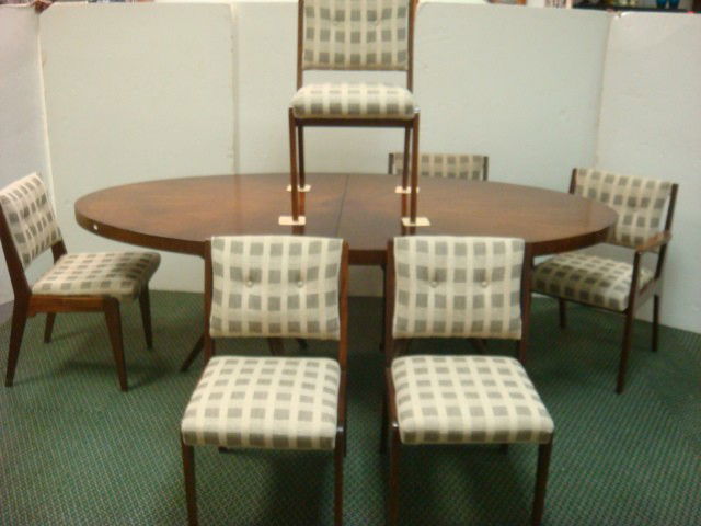 1950'S Oval Sunburst Dining Table and 6 Chairs: 1950'S Oval Sunburst Dining Table and 6 Chairs: Sunburst Matched Veneer Top on Double Star Shaped Legs. 3" Apron. Four Side and 2 Arm Check Upholstered Side Chairs Matching Table Style. 84 3/4"L X 44