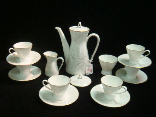 ROSENTHAL 15 Piece Tea Set: ROSENTHAL 15 Piece Tea Set: Petite Teapot, Creamer, Sugar (Chip), 6 Demitasse Sized Cups and Saucers. Rosenthal Green Mark on Bottom CA 1940. Few Chips, Cup Repaired. (80-150)