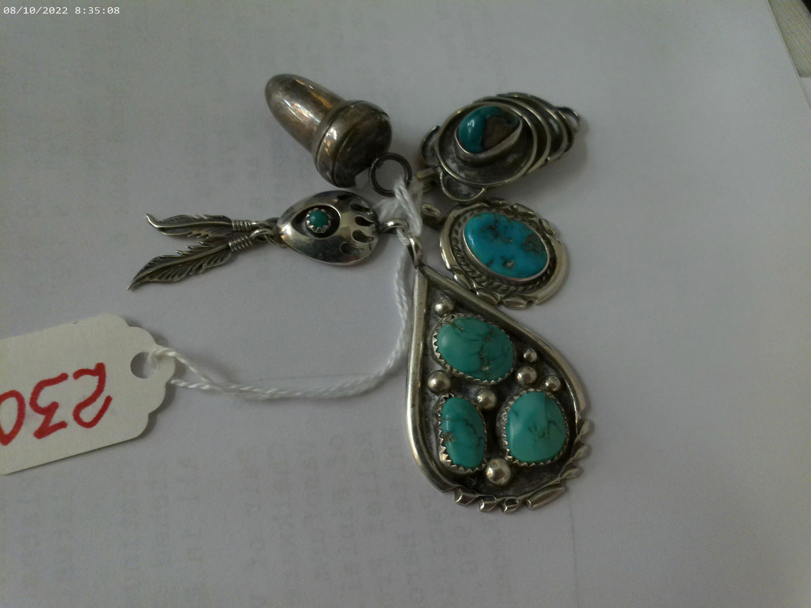 Four Native American Turquoise Sterling Pendants: (1 of 4)