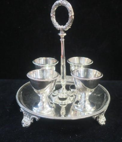 Antique ELKINGTON & CO Egg Holder Stand with Cups:: Antique ELKINGTON & CO Egg Holder Stand with Cups: CA 1801-1897. Round Silverplate Tray with Beaded Edge and Center Wreath Handle Holds 4 Removable Egg Cups. 7"T. E & Co Mark with Crown and F 8471. (6