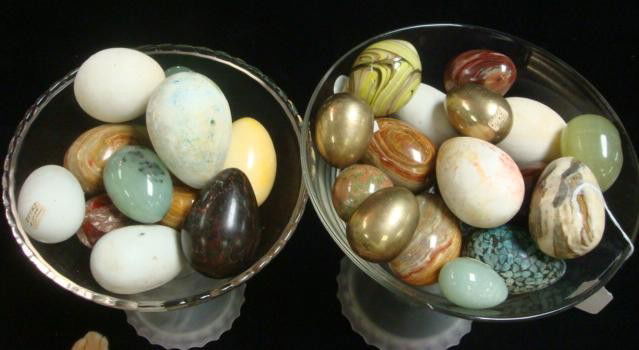 Twenty Nine Onyx, Alabaster, Marble, Wooden Eggs: Twenty Nine Onyx, Alabaster, Marble, Wooden Eggs: Eggs Range in Size from 1 3/4" to 3". Made from Different Types of Materials. Includes 3 Brass Eggs, and One Glass. (200-350)