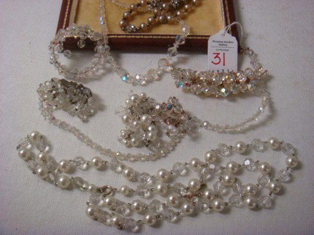 Collection of Ladies Costume Jewelry:: Collection of Ladies Costume Jewelry: Crystal Choker, Spiral Bracelet, Necklace with Pendant, Pair of Laguna Clip Earrings, Lapel Pin with Rhinestones, Rope with Pearls, Pearl and Rhinestone Necklace.