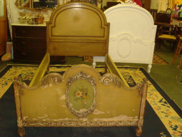 Pair of SLIGH FURNITURE French Twin Beds:: Pair of SLIGH FURNITURE French Twin Beds: One Has Original Shabby Green Finish with Floral Medallion on Foot Board and Carved Bow Crest. Other is Matching, but Has been Painted White. Each has Rails. 