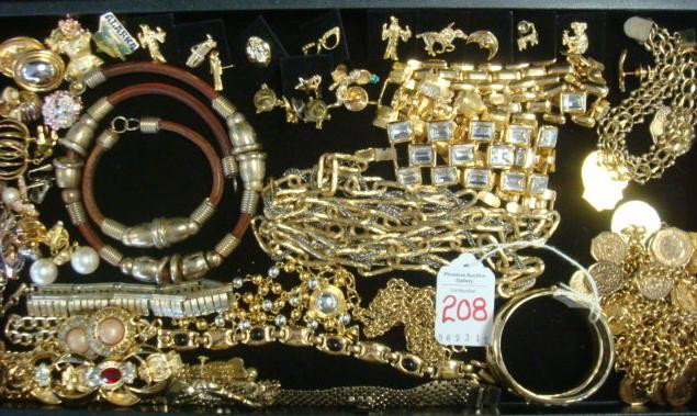 Goldtone Ladies Costume Jewelry:: Goldtone Ladies Costume Jewelry: Gold Filled Charm Bracelet, Coin Necklace, Sweater Clip, Mesh Bracelet with Earrings. Napier Necklace and Bracelet, Goldtone/Rhinestone Cuff Bracelet. 17 Plus Small La
