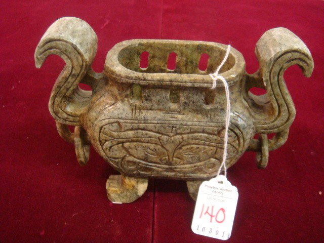Republic Period Chinese Jade Incense Burner:: Republic Period Chinese Jade Incense Burner: Double Curled Handle with Deep Line Carved Design on Front and Back. Oval Pierced Rim, Stands on Four Simulated Paw Feet. 7"L X 5"T. Circa 1920-1950. (200-