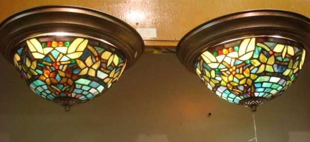 Pair of Dome Shaped Stained Glass Ceiling Fixtures: Pair of Dome Shaped Stained Glass Ceiling Fixtures: Three Bulb. Variegated Glass in Shades of Blue and Green with Leaf Pattern and Berry Buttons. Mount is 13"D. (100-150)