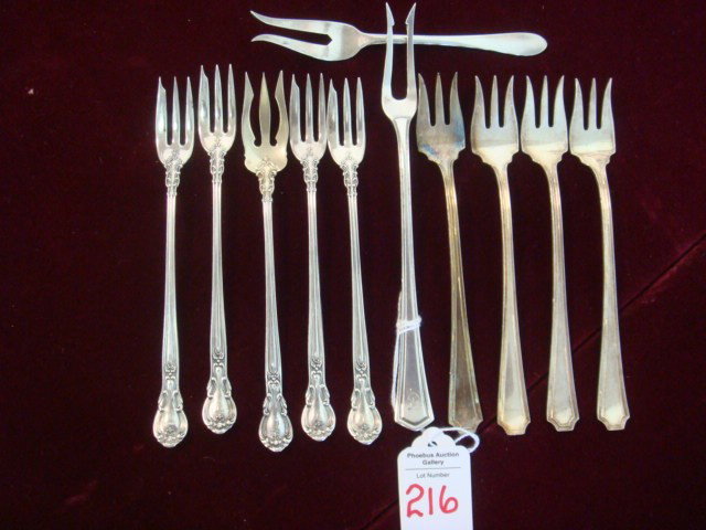Eleven Sterling Silver Seafood and Pickle Forks:: Eleven Sterling Silver Seafood and Pickle Forks: Includes in Gorham Chantilly, Four Seafood Forks and One Pickle Fork, Four Durgin Fairfax Seafood Forks, Mauser Pickle Fork and Unmarked Lemon Fork. 5.