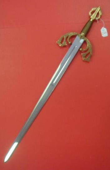 EL CID, Spanish Broad Sword with Sword Breaker Gri: EL CID, Spanish Broad Sword with Sword Breaker Grip: 31" Blade with Blood Groove. 6" Pommel with Wire Handle. Replica of Sword of Spanish Knight Rodrigo de Vicar "El Cid Campeador" in the IX Century.