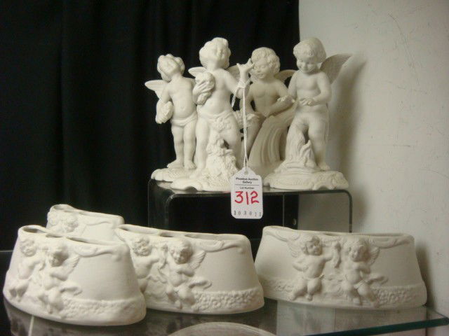 DRESDEN Four Seasons Cherubs with Flower Holders: DRESDEN Four Seasons Cherubs with Flower Holders: Each 5 1/2"T Bisque Cherub Represents a Different Season. Four Curved Flower Holders are 2 1/8"T, 6"L with Cherubs in Relief. Blue N Under Crown Dresd