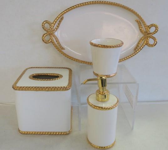 Four Piece White Ceramic Bath Accessories, Gold Trim:: Four Piece White Ceramic Bath Accessories, Gold Trim: Designed by Jamie Drake. Gold Rope Cords and Bows Trim. Oval Tray 14" X 8", Tissue Box 6"T & Square, 7 1/2"T Round Lotion Pump Dispenser, 3 3/4"T 