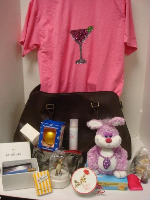 Large Brown Tote Bag with Cosmetics and Gifts: Large Brown Tote Bag with Cosmetics and Gifts: Hallmark Musical Ornament, Red Skins Ornament, Guerlain Lotions, Tweety Ornament, Gildane Sequined Shirt, Estee Lauder Brush, Evian Face Spray, Makeup Ba