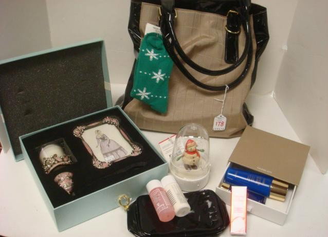 ESTEE LAUDER Tote with Makeup and Holiday Gifts: ESTEE LAUDER Tote with Makeup and Holiday Gifts: Pompadour Enameled Frame Candle Holder and Snuffer with Rhinestones. Guerlain Lotions, Hallmark Musical Ornament, Christmas Socks. Lauder Makeup Bag wi