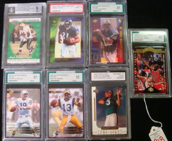 Seven Graded Sports Cards, Football & Basketball: Seven Graded Sports Cards, Football & Basketball: Michael Jordon 9.0, Kurt Warner 9.0, Donavan McNabb 10.0, Peyton Manning 9.5, Ricky Williams 9.0, Jamal Lewis 9.0, Peyton Manning 9.5 In Sealed Plasti