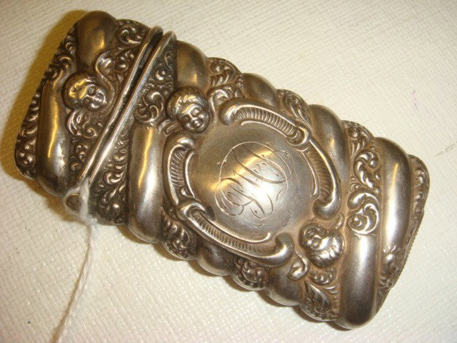 Sterling Silver Match Safe from Drewry Estate:: Sterling Silver Match Safe from Drewry Estate: Patrick Henry Drewry, Congressman from Petersburg Virginia from 1935-1947. 2 1/2"T Safe with Cherub Heads. Striker on Bottom. Engraved PHD in Cartouche. 