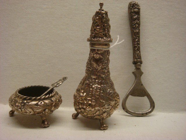 STIEFF Rose Pepper Shaker, Salt Dip, Bottle Opene: STIEFF Rose Pepper Shaker, Salt Dip, Bottle Opener: Footed Pepper Shaker is 4 1/2"T. Matching Salt Dip is 2"D. Bottle Opener is 5 1/2"L with Sterling Handle. Includes Small Salt Spoon. (100-200)